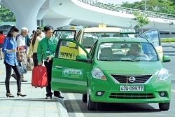 mot hang taxi o sai gon dong cua vi ap luc canh tranh tu uber grab