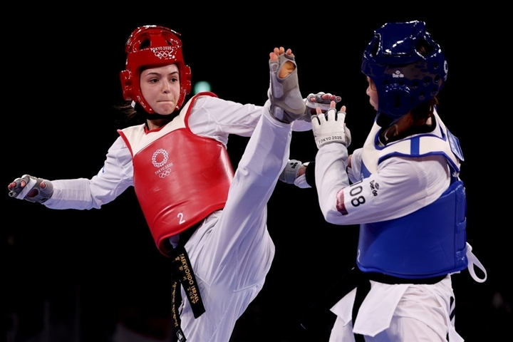 Olympic Tokyo 2020: Vẻ đẹp hút hồn của nữ võ sĩ Israel gây sốt dân mạng - 1
