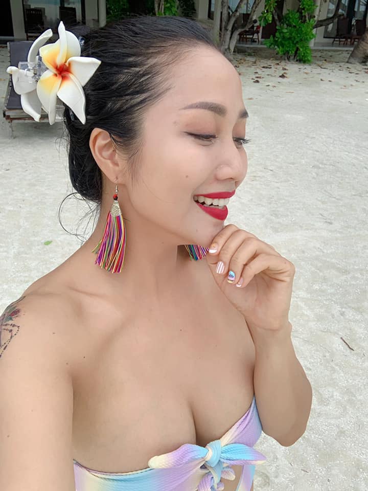 oc thanh van mac bikini khoe vong 1 dot mat tinh tu ben chong