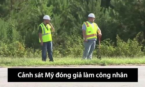 canh sat my dong gia cong nhan de phat hien tai xe dung dien thoai