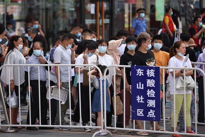 Trung Quốc ghi nhận số ca nhiễm COVID-19 cao nhất trong nửa năm qua