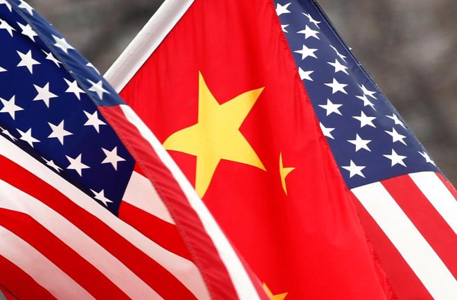 Mỹ giáng đòn trừng phạt mạnh tay đối với 14 quan chức Trung Quốc - 1