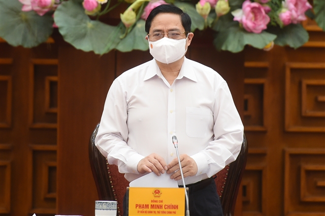 Thủ tướng Phạm Minh Chính chủ trì họp khẩn chống dịch COVID-19 - 1