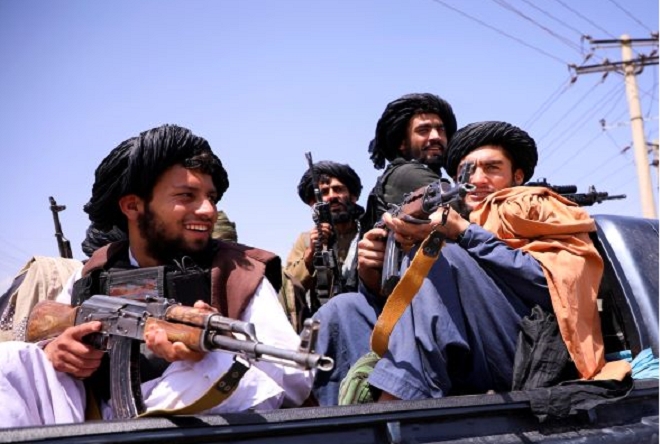 Taliban xả súng ăn mừng, 17 người thiệt mạng - 1