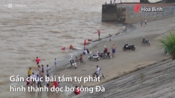 thuy dien hoa binh mo cua xa day ron nguoi nhin tre em vui dua o bai tam tu than