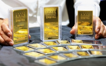Giá vàng hôm nay 27/11: Vàng và USD đều suy giảm